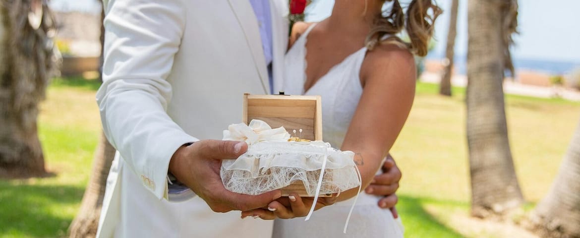 A happy couple sharing a special moment during their outdoor wedding in Spain.