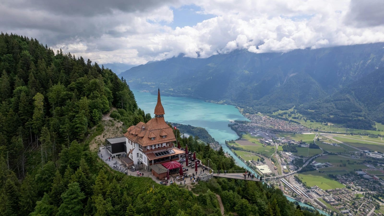 Destination Wedding Switzerland 6 Breathtaking aerial view of Harder Kulm restaurant with Lake Brienz and mountains in Interlaken, Switzerland.
